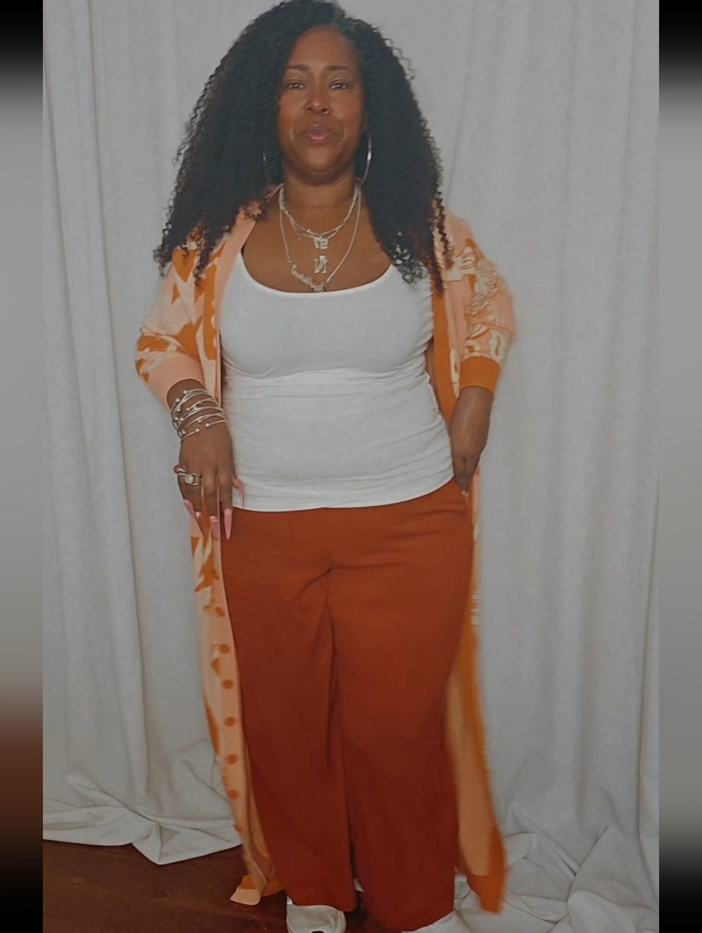 Eloquii Peach and Burnt Orange Knit Cardigan Label View
